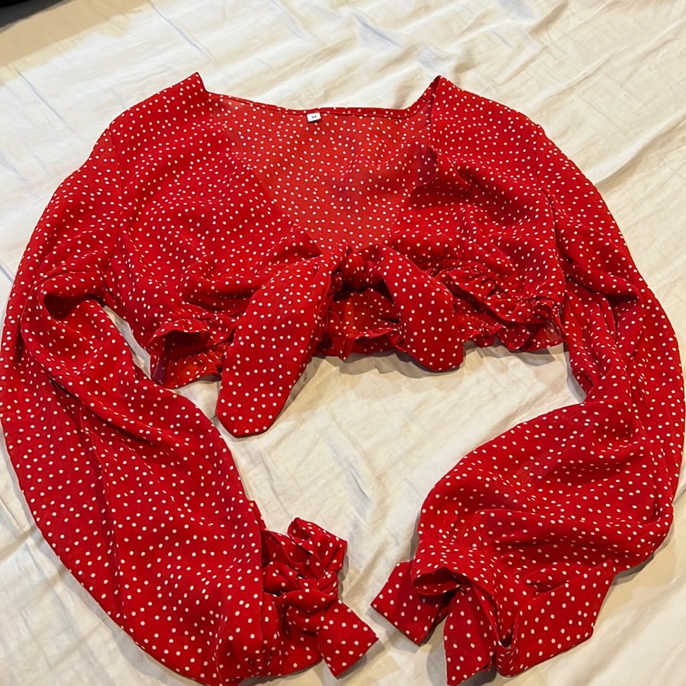 Lightly used. Tie crop top. Size M. Brand N/A $10 or best offer